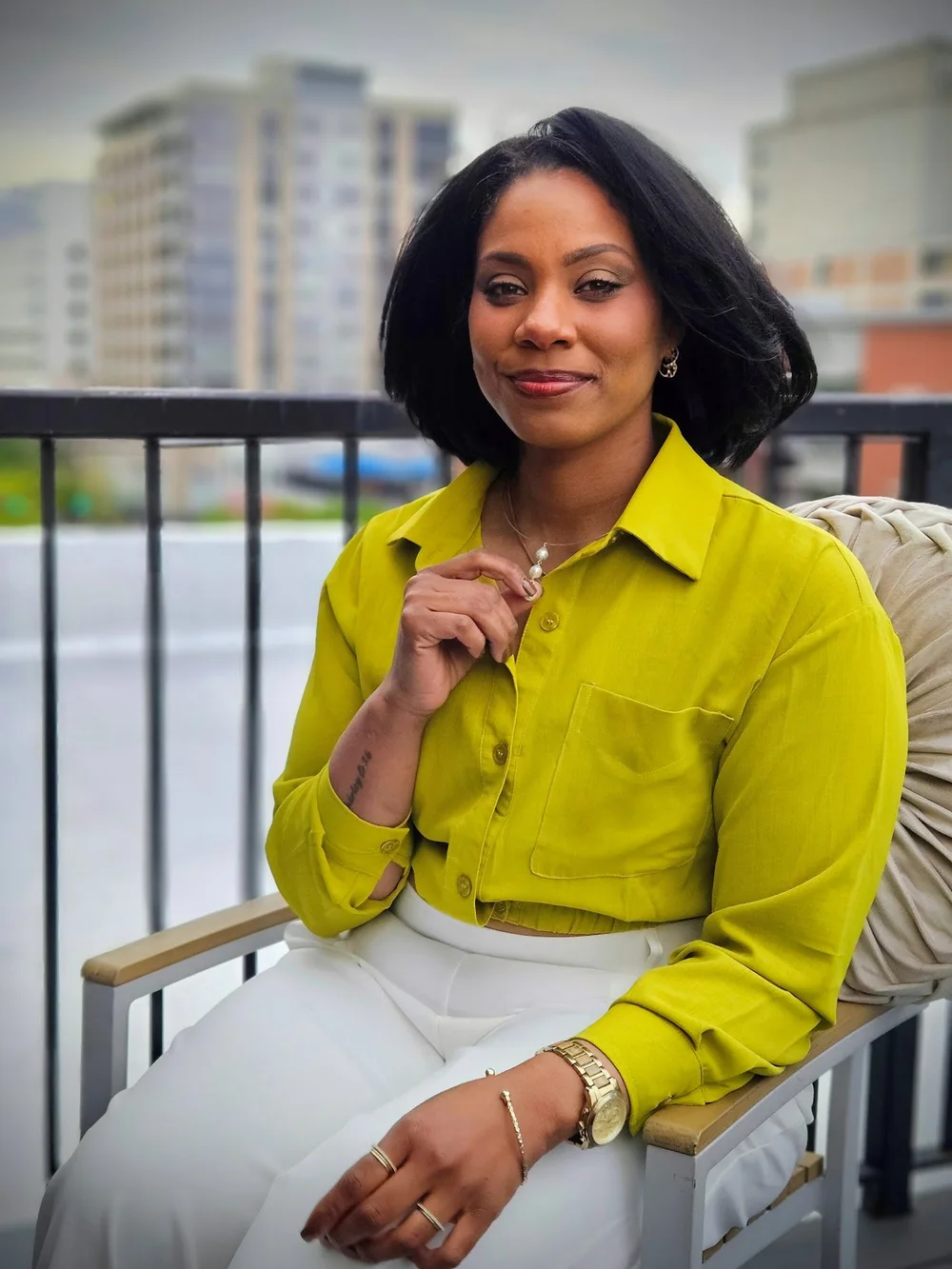 Kalisha Pettus seated for a professional portrait in Chicago